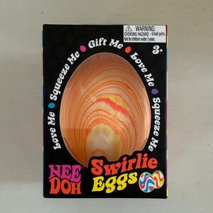 Nee Doh Swirlie Egg in Orange and Yellow